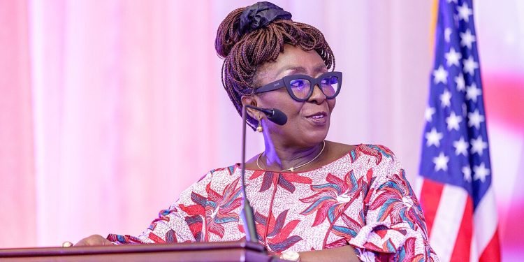 Minister for Tourism, Culture and Creative Arts Abla Dzifa Gomashie speaking at a lectern