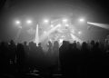 Guests under stage lights at an EMY Africa awards event in Accra