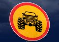 Official artwork for Road Rage by M.anifest and Black Sherif, showing a monster truck on a red and yellow road sign