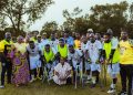 Stonebwoy poses with players and officials of the Black Challenge, Ghana's national amputee football team